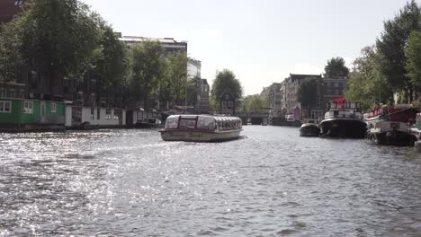 touristic-boat-cruise-in-beautiful-old-town-of-amsterdam,-netherlands