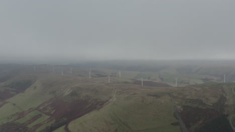 Drone-shot-of-rolling-english-countryside-with-hills-and-fields