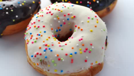 delicious donuts with sprinkles