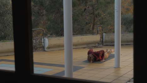 A-woman-doing-her-Yoga-routine