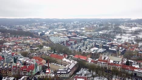 Aerial-shot-of-a-northern-European-residential-area-covered-in-snow