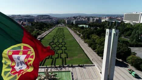 Portugal-national-flag-waving-in-Lisbon,-Portugal