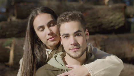 portrait shot of attractive young couple looking at camera