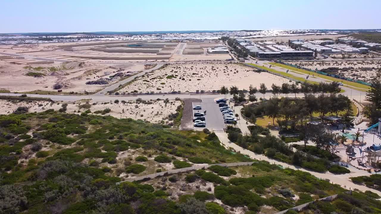 Aerial View of a Coastal Housing Development and Park
