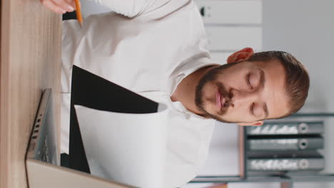 business man reading business contract planning project analyzing resume good paperwork results