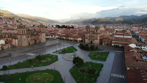 daytime 4k aerial footage of plaza de armas in cusco city, peru during coronavirus quarantine, left to right truck and pan, jib down, wide angle shot