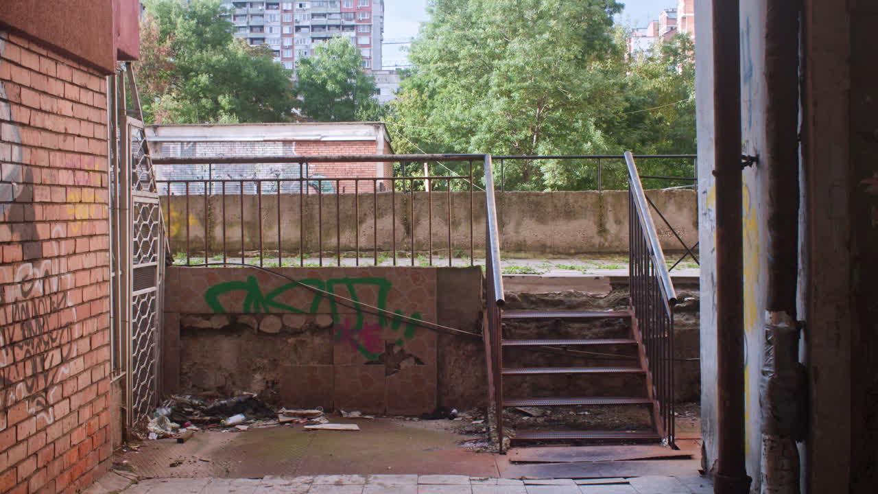 A neighborhood with brutalist, communist architecture apartment buildings and the surrounding neighborhood environment from the communist era in Eastern Europe