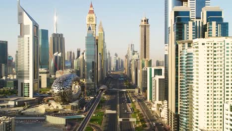 ariel shot of a city with high buildings and traffic moving