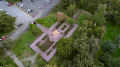 Aerial-orbit-establishing-of-the-Thailand-square-in-the-Araucano-Park-in-Santiago-Chile,-representative-asian-architecture