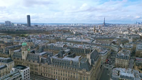 sorbonne university with montparnasse tower and tour eiffel in background, paris cityscape, france