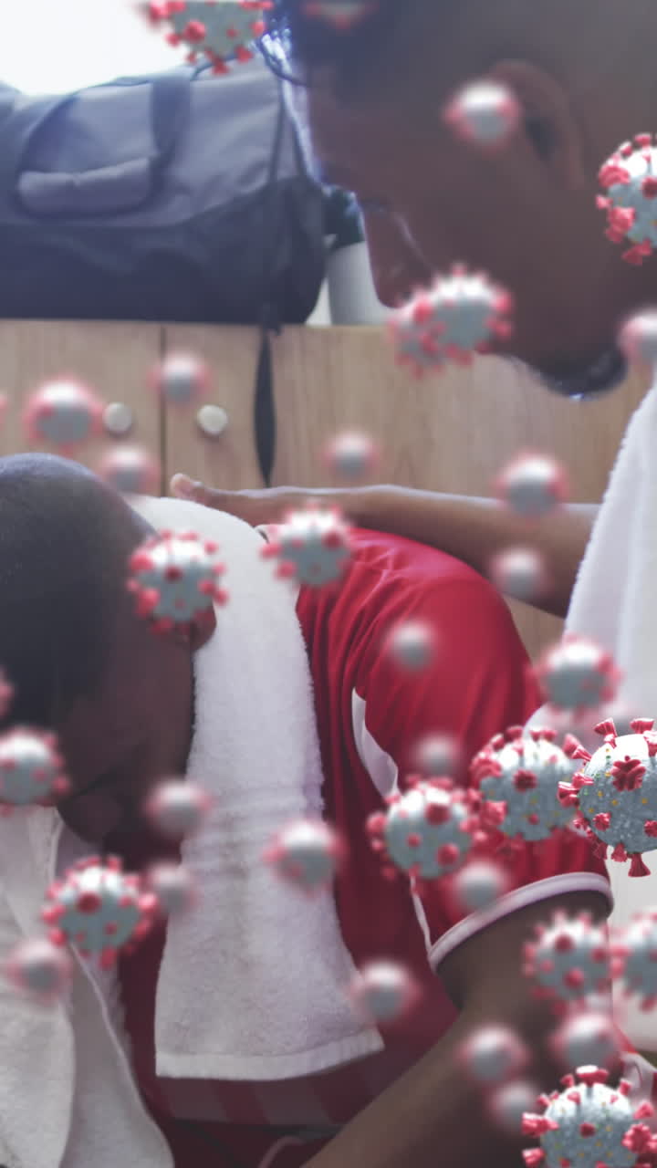 변기실에서 남성 축구 선수들의 다양한 그룹 위에 떠다니는 바이러스 세포의 애니메이션