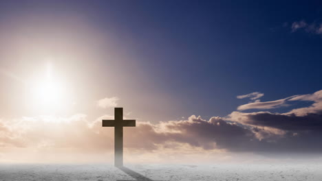 animation of christian cross over sun shining on blue sky with clouds