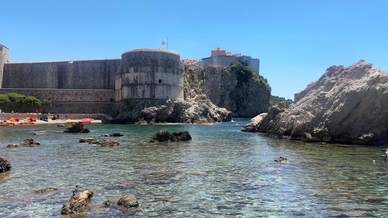 Korcula town city harbour port beach from a boat in the adriatic sea in croatia