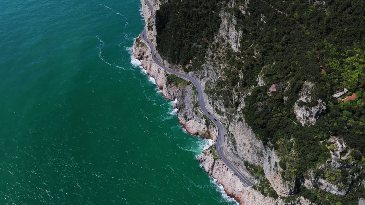 Aerial View Of The Stunning Cliffside Road Along Noli Coastline Of Liguria, Italy.