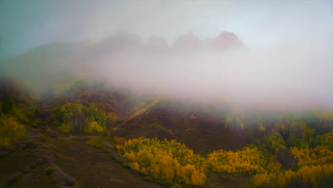 Mist-covers-the-high-mountains-of-Maroon-Bells-in-Colorado-on-a-autumn-day