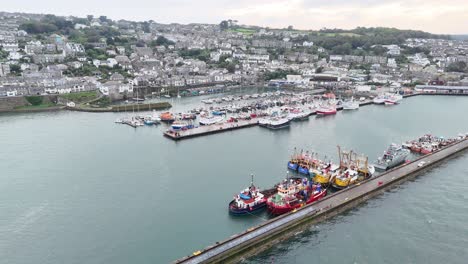 newlyn harbour cornish fishing port pull back drone aerial reverse reveal