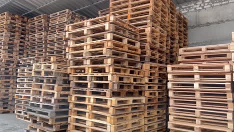 Warehouse of Pallet Racks Logistics Center. Warehouse of pallet racks, logistics center. A huge, large modern warehouse. The warehouse is filled with wooden shelves