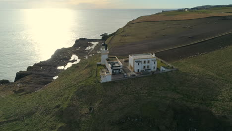 Aerial-view-of-Todd-Head-lighthouse-in-Aberdeenshire,-Scotland