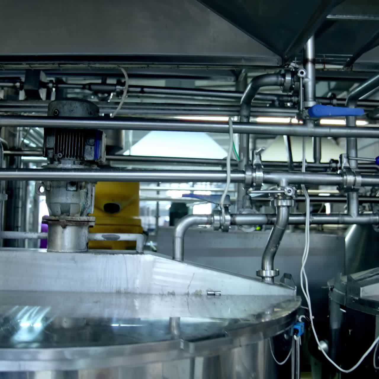 Stainless cheese factory storages. Modern cheesemaking technologies