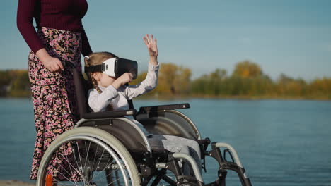 girl with spinal cord injury plays game in vr glasses