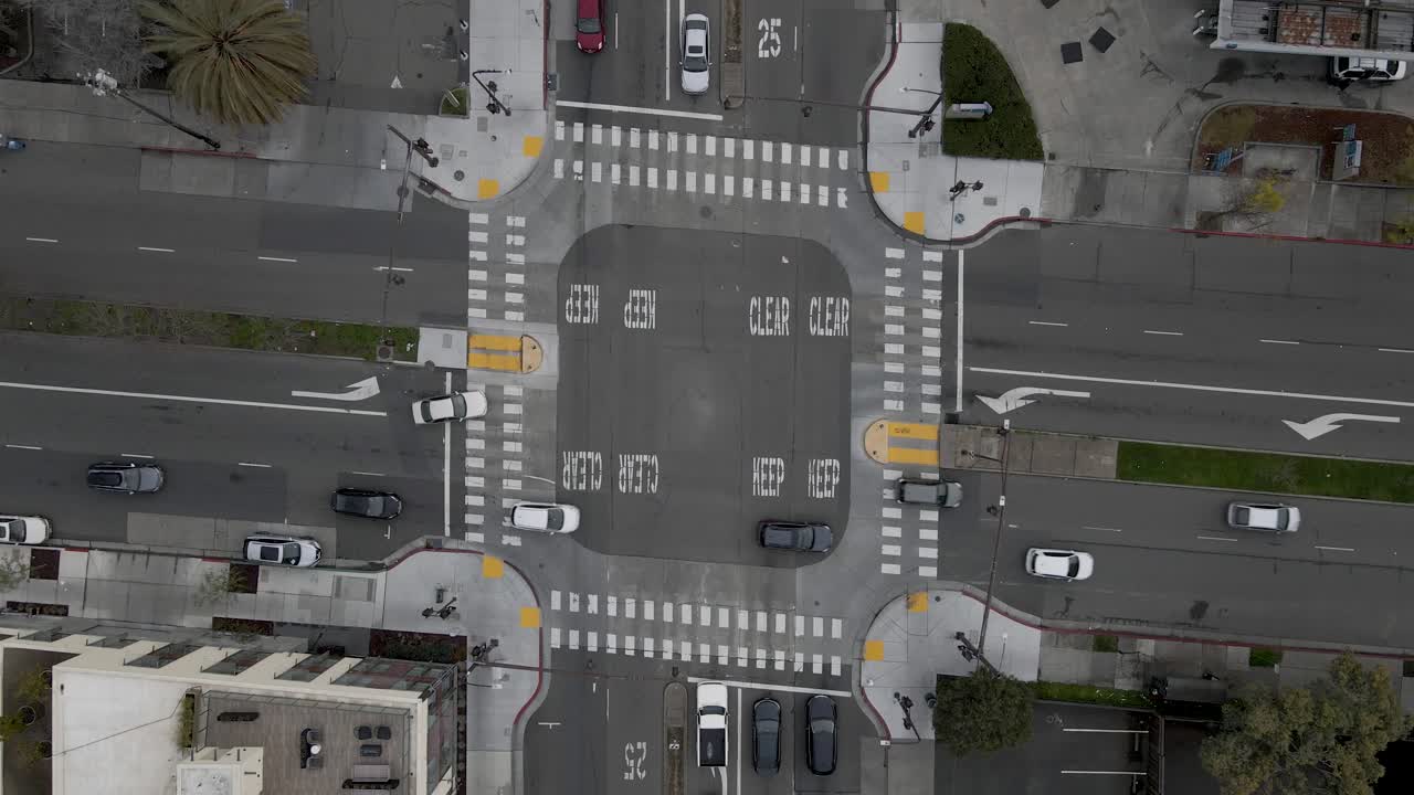 From a bird's eye view on a serene, Saturday morning after the rain, this still drone shot provides an uncommon perspective of the crossing at University and Sacramento Street in Berkeley, CA