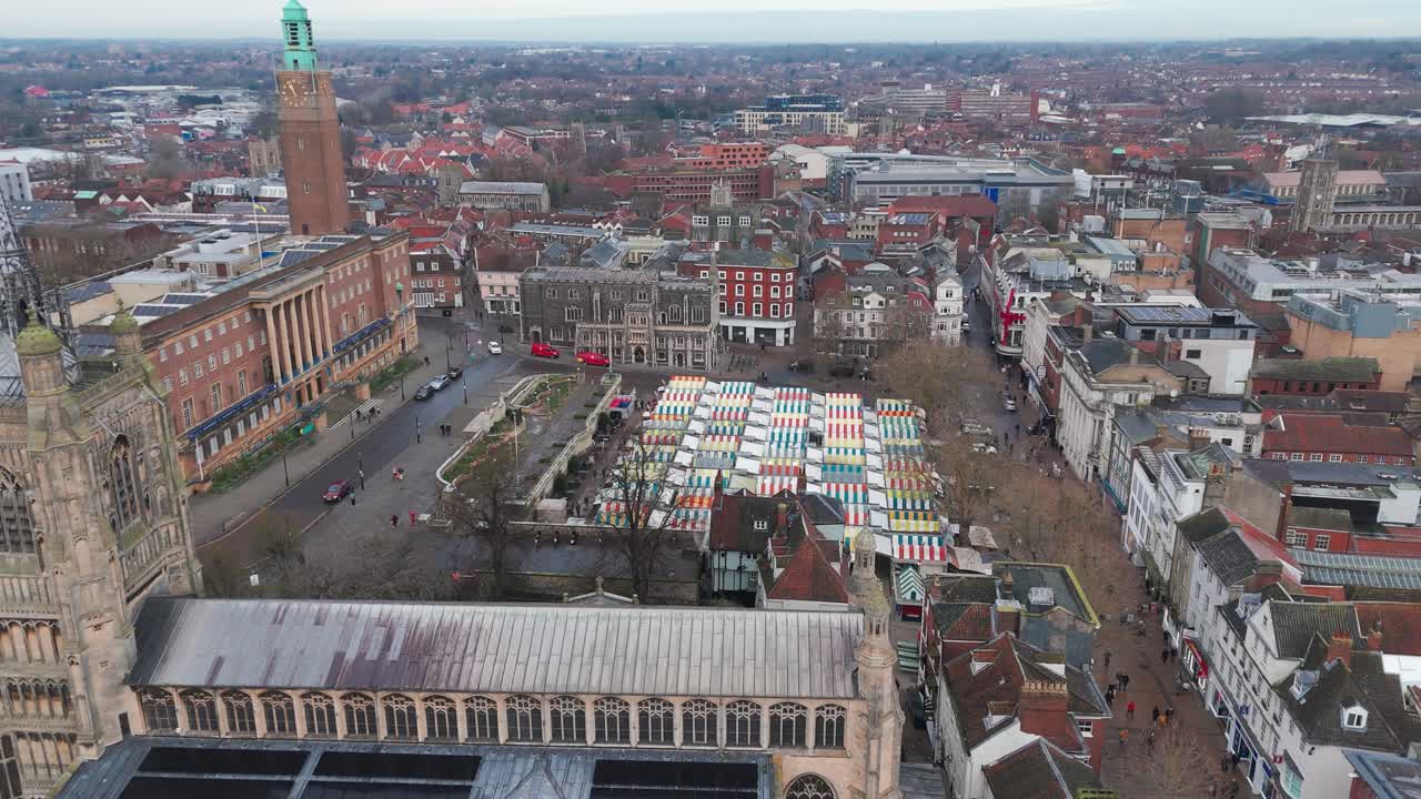 Norwich, norfolk, showing market stalls, churches, and historic streets , aerial view