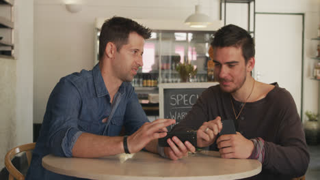 caucasian men spending time together in a coffee