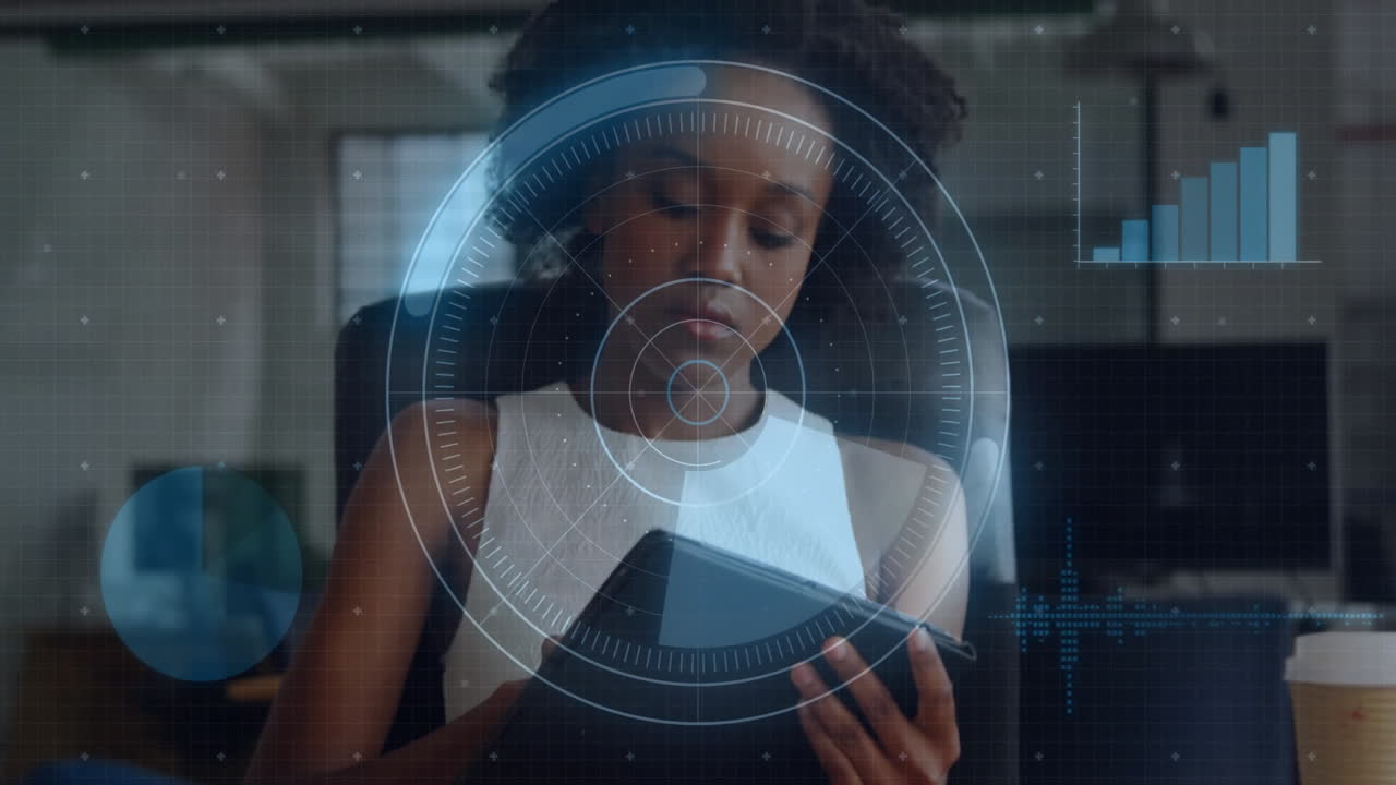 Using tablet, businesswoman analyzing digital data with processing animation overlay