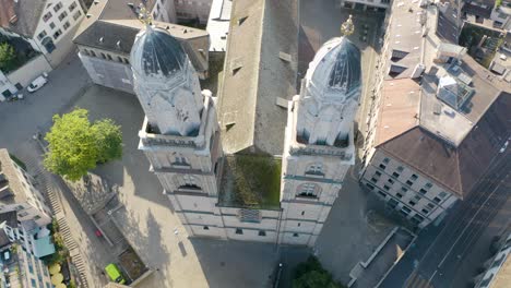 close up aerial shot of famous grossmünster cathedral in zurich, switzerland