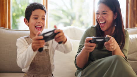 video game, happy and mother with child on a sofa