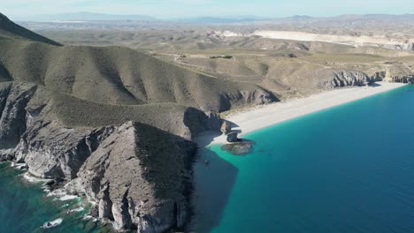 Playa-de-los-Muertos-Beach-in-Cabo-de-Gata,-Andalusia,-Spain---Aerial-4k