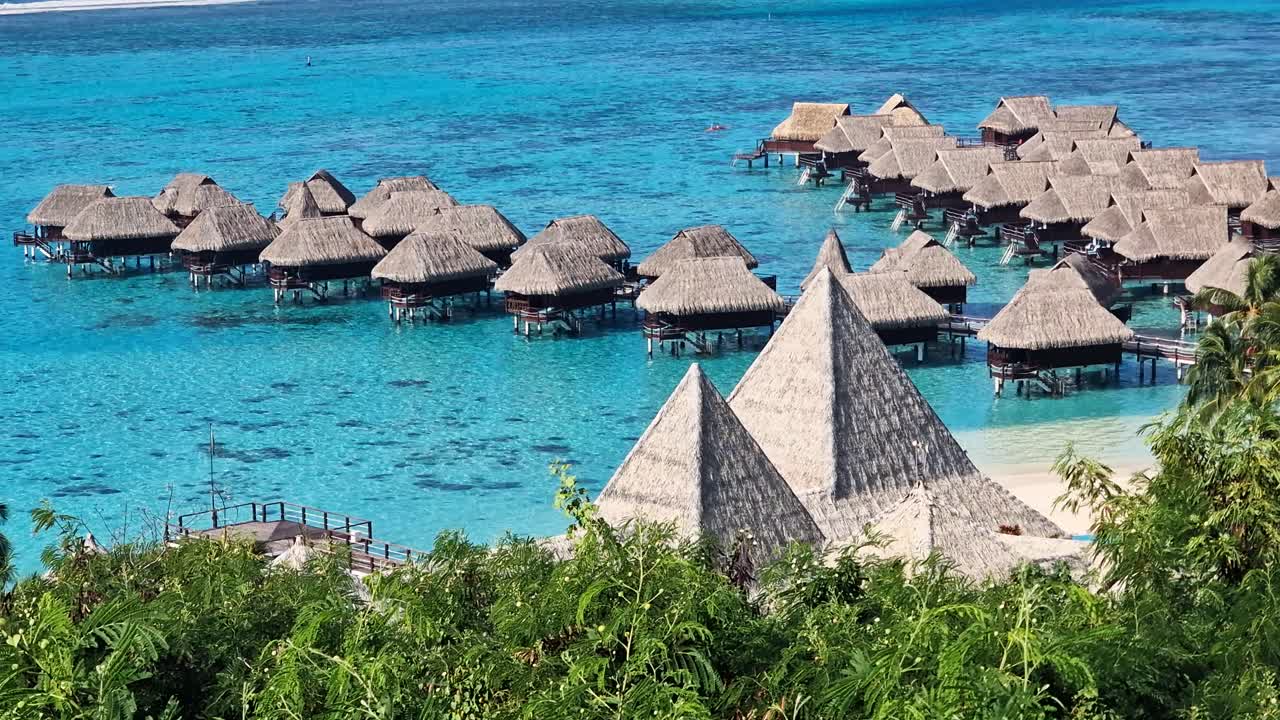 Island on French Polynesia, Traditional Overwater Bungalows, Part of Luxury Tropical Resort on Turquoise Lagoon Water