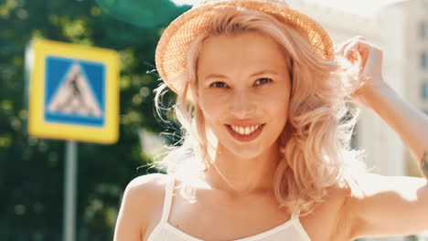 smiling woman in straw hat