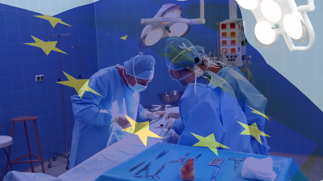 Animaatio Euroopan unionin lipusta valkoihoisten nais- ja mieskirurgien yllä leikkauksen aikana.