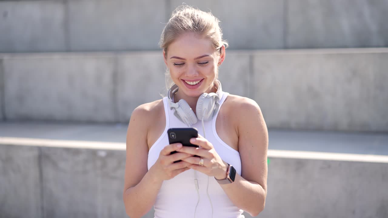 Woman using smartphone outdoors