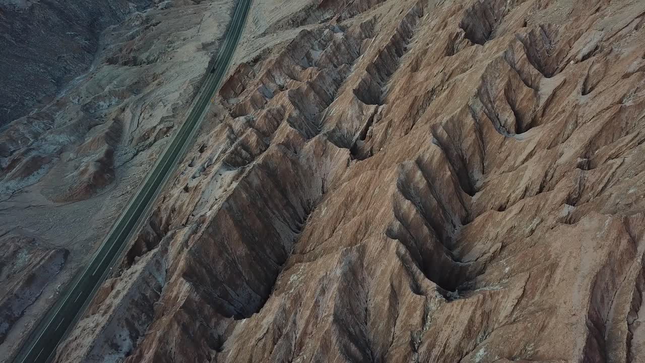 Cinematic Aerial View of Atacama Desert Road Between Death and Valley of The Moon, Chile