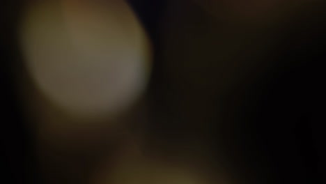 la luz multicolor filtra imágenes de 4k sobre fondo negro, vídeo estilizado, transiciones, efecto bokeh
