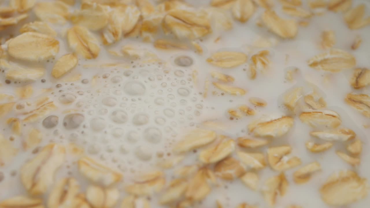 Pouring Milk into Oatmeal