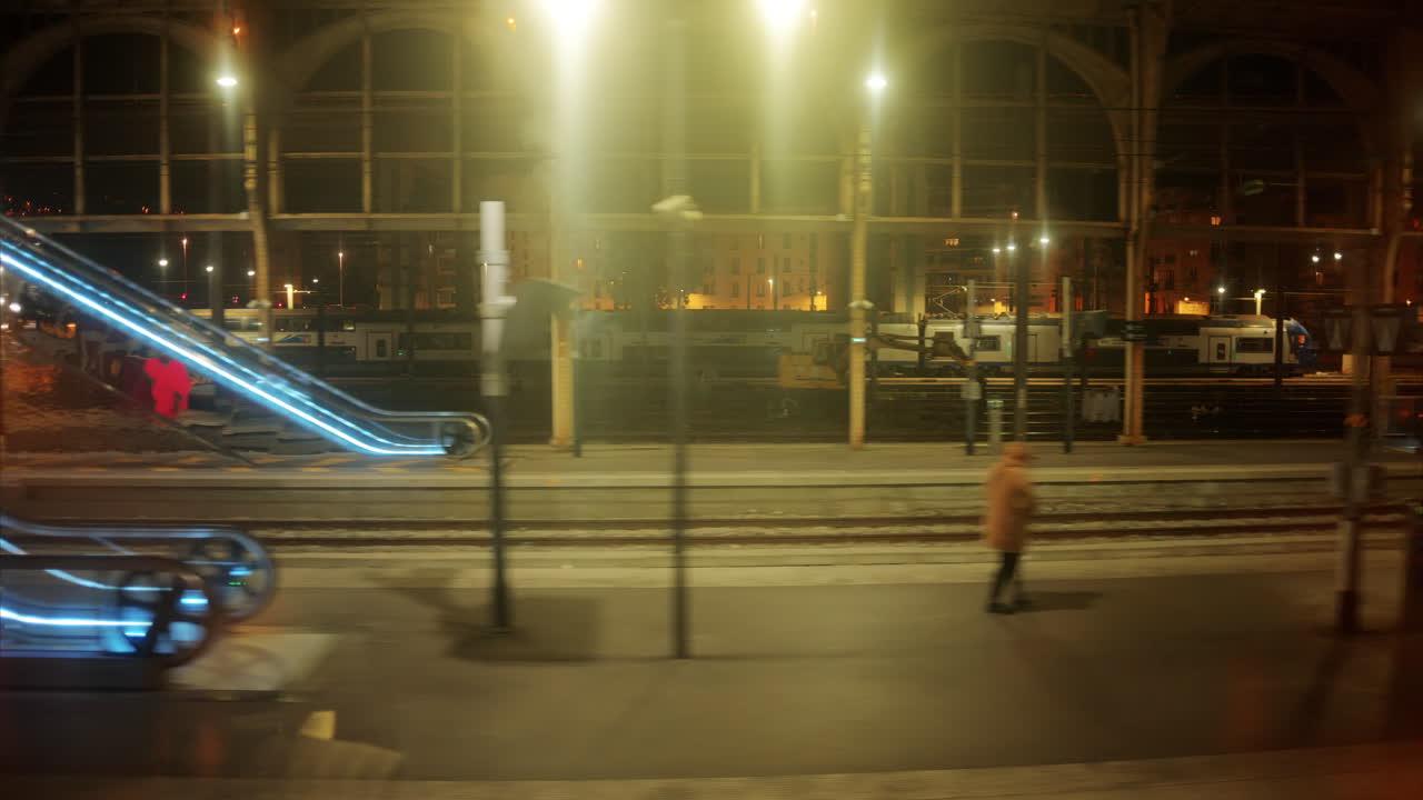 Monte Carlo, Monaco - October 4, 2024: Train moving through the Monaco train station with bright lights