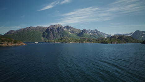 Panoramic view of the majestic Norweginan fjords filmed from the sea. Untouched nature. Picturesque nordic landscape.