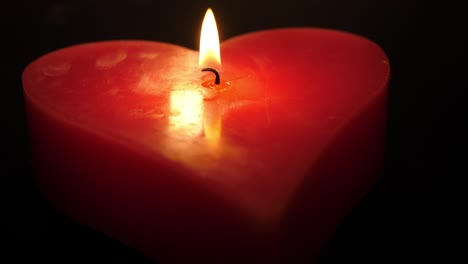 big heart shaped candle burning endlessly romantic seamlessly looping video background for valentines day
