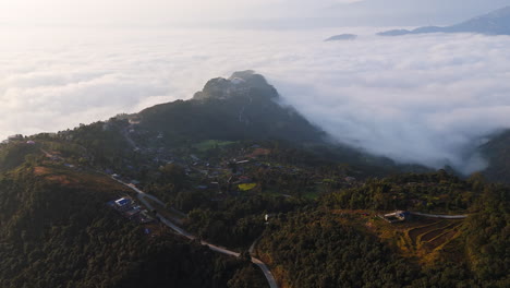 panoramic drone shot of the foggy phewa lake from the sarangkot mountain in nepal