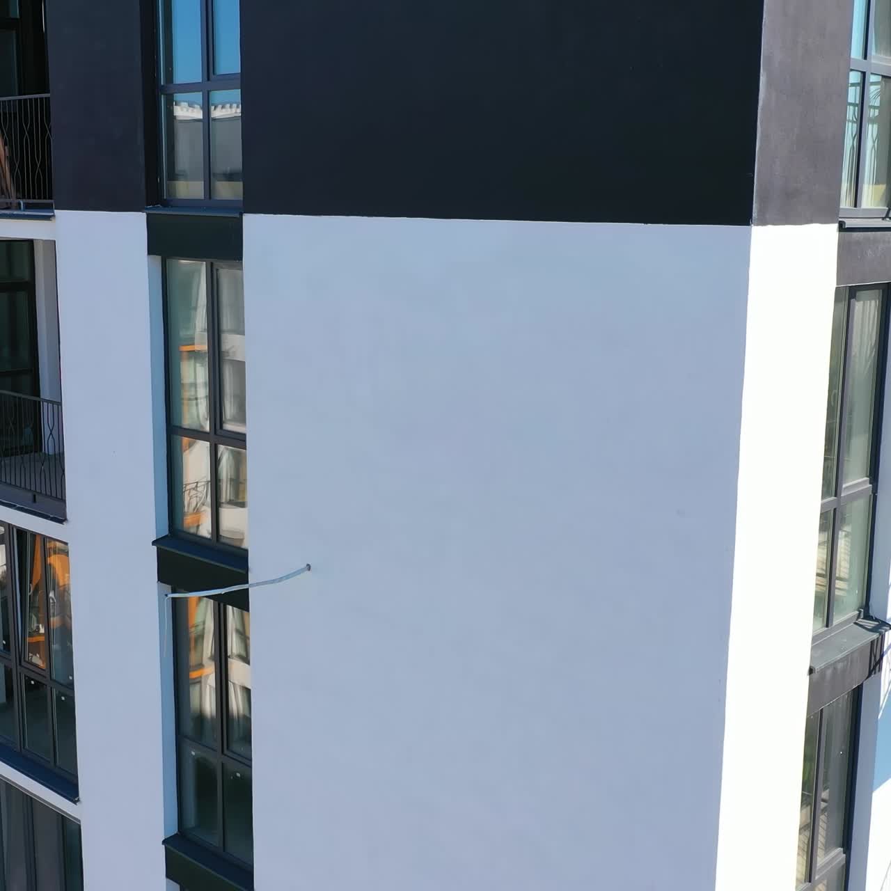 City modern building on aerial view. Contemporary residental building in the city