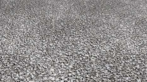 an aerial view over decorative white stone gravel - seamless looping