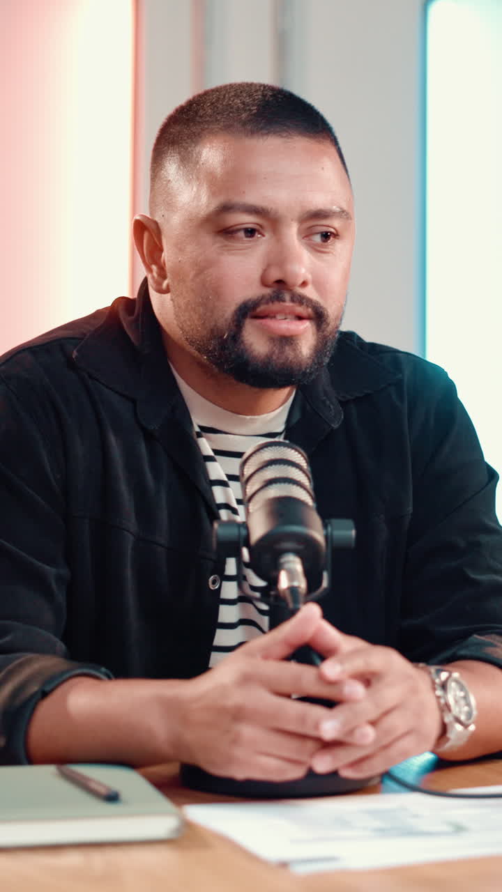 Man recording a podcast in a studio
