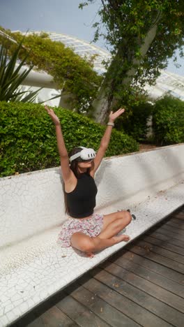 woman meditating outdoors with vr headset