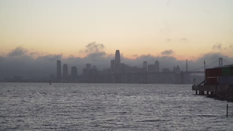 static shot of a peaceful evening in oakland viewing san francisco across the bay
