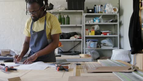 Carpenter-working-at-table-4k