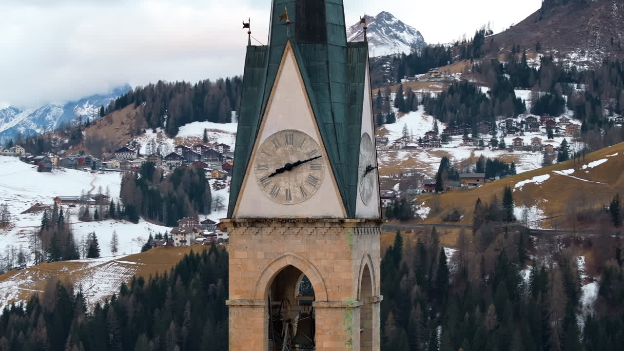 Aerial drone view of the San Lorenzo Church in the Selva di Cadore comune, in the Dolomites, Italy