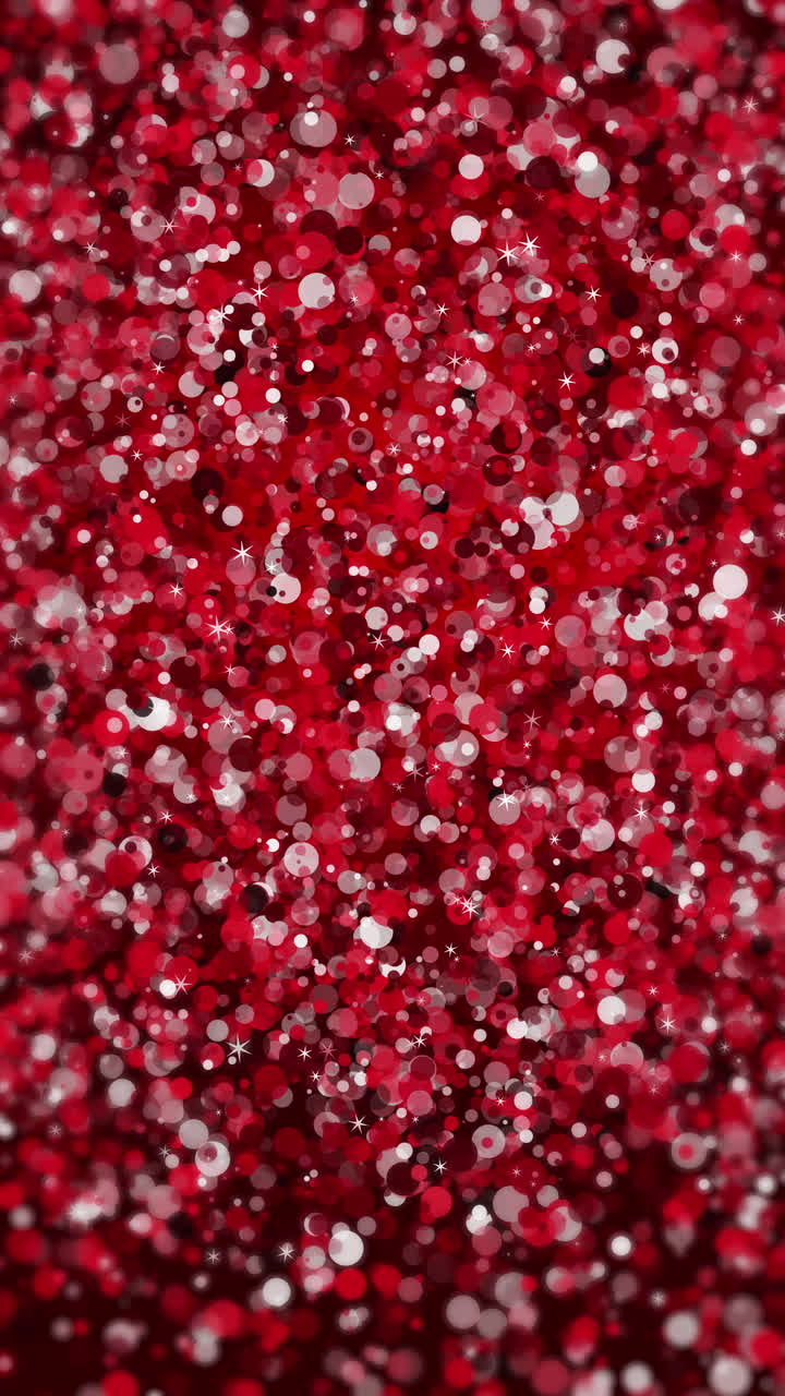 Red glitter loop animation. Festive shiny background for text. Vertical video.